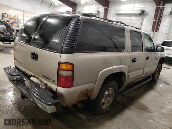 2000 Chevrolet Suburban with VIN 1GNFK16T9YJ169393, listed as a Copart auction lot 84970004 with 304,002 mi miles and Salvage title. Bid and sale history available at DreamBid. Image 3.
