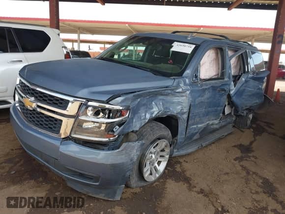 2015 Chevrolet Tahoe LS with VIN 1GNSCAEC1FR644594, listed as a IAAI auction lot 42650710 with 106,430 mi miles and . Bid and sale history available at DreamBid. Image 17.