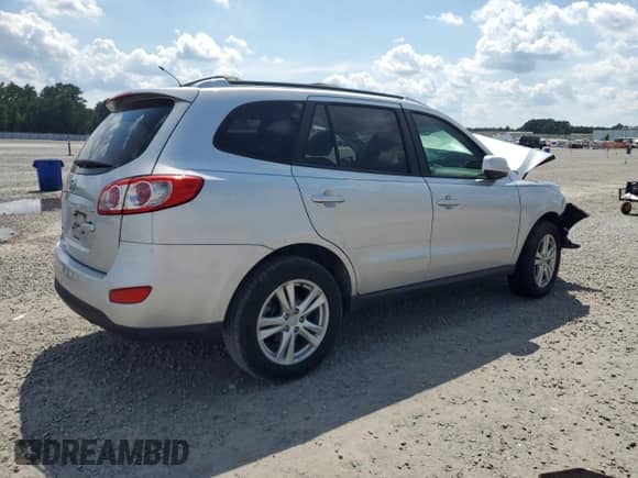 2012 Hyundai Santa Fe SE с VIN 5XYZH4AG4CG097589, выставлен на аукционе Copart как лот 69226535 с пробегом 80 577 миль миль и Списание • Salvage title. История ставок и продаж доступна на DreamBid. Изображение 3.