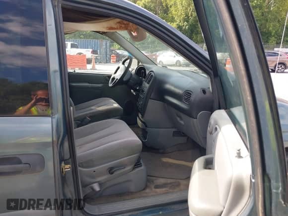 2006 Dodge Caravan SE with VIN 1D4GP25R76B738164, listed as a IAAI auction lot 43095860 with 242,016 mi miles and . Bid and sale history available at DreamBid. Image 5.