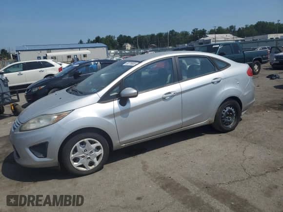 2011 Ford Fiesta S с VIN 3FADP4AJ1BM108290, выставлен на аукционе Copart как лот 66379865 с пробегом 112 342 миль миль и Чистый • Clean title. История ставок и продаж доступна на DreamBid. Изображение 1.