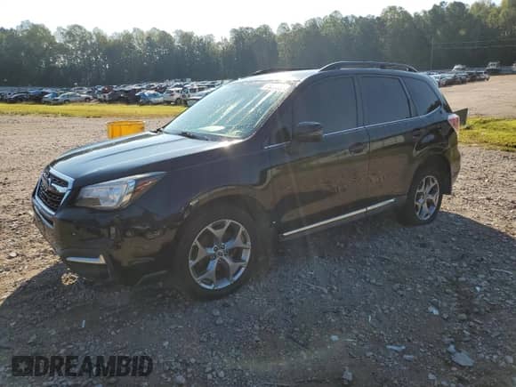 2018 Subaru Forester Touring z VIN JF2SJAWC1JH464268, wystawiony jako Copart lot #71262065 z przebiegiem 182 799 mil mil oraz Szkoda całkowita • Salvage title. Historia ofert i sprzedaży dostępna na DreamBid. Obrazek 1.