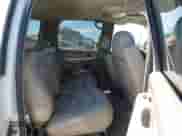 2002 Chevrolet Suburban LT z VIN 3GNFK16T82G356407, wystawiony jako IAAI lot #42818297 z przebiegiem 422 552 mil mil oraz . Historia ofert i sprzedaży dostępna na DreamBid. Obrazek 8.