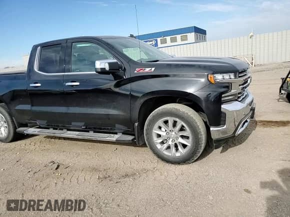 2019 Chevrolet Silverado 1500 LTZ with VIN 1GCRYGED1KZ338994, listed as a Copart auction lot 55901185 with 42,862 mi miles and Salvage title. Bid and sale history available at DreamBid. Image 13.