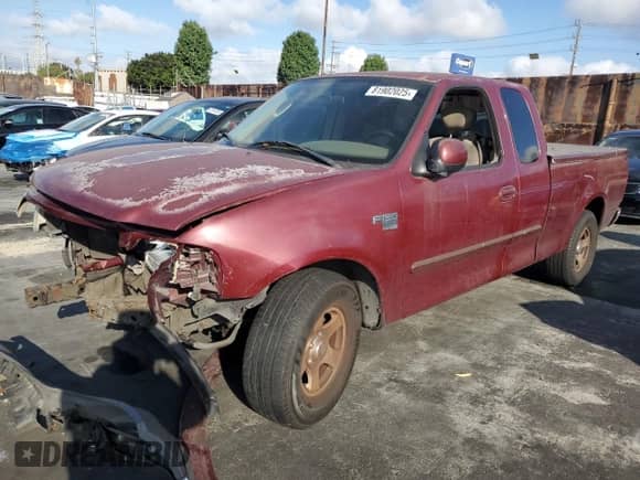 2003 Ford F-150 XL with VIN 1FTRX17W33NA89735, listed as a Copart auction lot 81902025 with 243,918 mi miles and Salvage title. Bid and sale history available at DreamBid. Image 1.