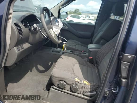 2007 Nissan Frontier LE with VIN 1N6AD06W57C409265, listed as a Copart auction lot 68547235 with 135,511 mi miles and Salvage title. Bid and sale history available at DreamBid. Image 7.