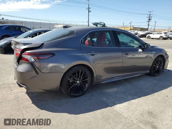 2021 Toyota Camry Hybrid XSE with VIN 4T1K31AK9MU565539, listed as a Copart auction lot 86149585 with 115,658 mi miles and Salvage title. Bid and sale history available at DreamBid. Image 3.