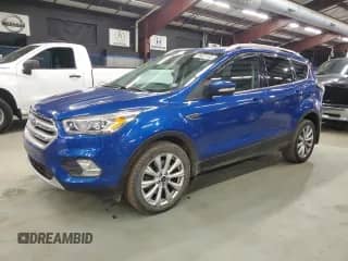 2017 Ford Escape Titanium с VIN 1FMCU9J95HUC08605, выставлен на аукционе Copart как лот 90461165 с пробегом 136 216 миль миль и Чистый • Clean title. История ставок и продаж доступна на DreamBid. Изображение 1.