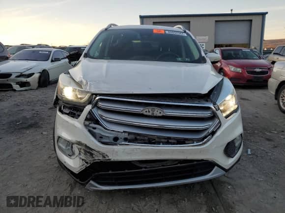2017 Ford Escape Titanium with VIN 1FMCU9JD3HUC71416, listed as a Copart auction lot 80850384 with 99,838 mi miles and Salvage title. Bid and sale history available at DreamBid. Image 5.