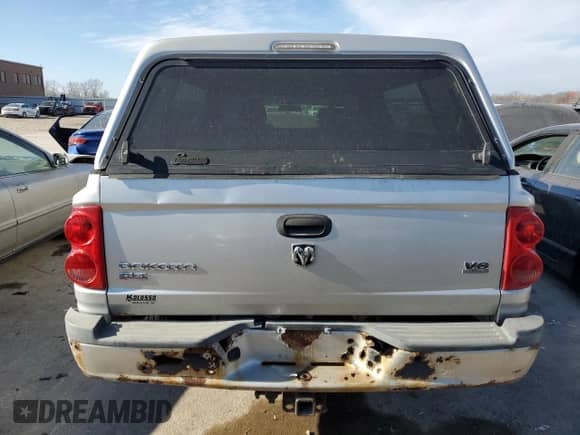2006 Dodge Dakota with VIN 1D7HW42J96S607693, listed as a Copart auction lot 85983064 with 119,357 mi miles and Salvage title. Bid and sale history available at DreamBid. Image 6.