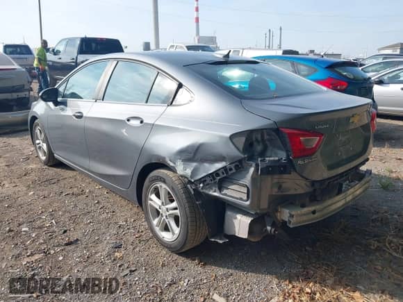 2018 Chevrolet Cruze LT with VIN 1G1BE5SM9J7204353, listed as a IAAI auction lot 43227526 with 97,365 mi miles and . Bid and sale history available at DreamBid. Image 3.