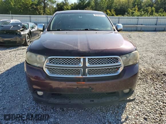 2012 Dodge Durango SXT with VIN 1C4RDJAG3CC147235, listed as a Copart auction lot 84365645 with 242,191 mi miles and Salvage title. Bid and sale history available at DreamBid. Image 5.