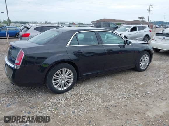 2014 Chrysler 300 с VIN 2C3CCARG4EH217892, выставлен на аукционе IAAI как лот 42788576 с пробегом 111 383 миль миль и . История ставок и продаж доступна на DreamBid. Изображение 4.