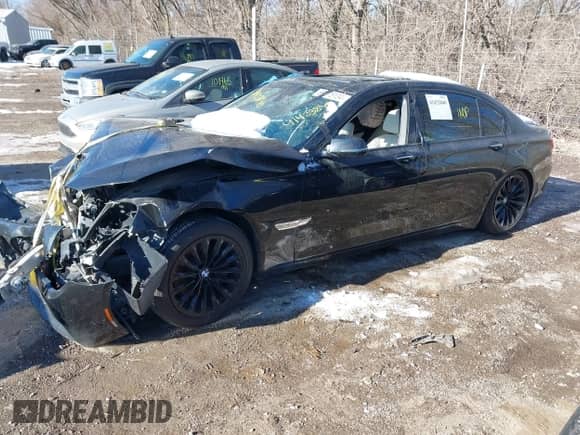 2013 BMW 7 Series 740Li xDrive with VIN WBAYF4C51DD127691, listed as a IAAI auction lot 41423840 with 90,916 mi miles and . Bid and sale history available at DreamBid. Image 19.
