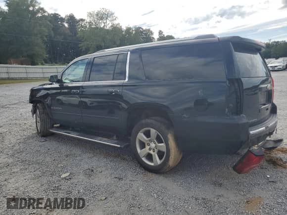 2016 Chevrolet Suburban LTZ с VIN 1GNSKJKC5GR326373, выставлен на аукционе Copart как лот 81813295 с пробегом 197 611 миль миль и Списание • Salvage title. История ставок и продаж доступна на DreamBid. Изображение 2.