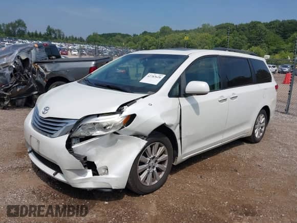 2011 Toyota Sienna XLE AAS with VIN 5TDYK3DCXBS036300, listed as a IAAI auction lot 42783620 with 199,813 mi miles and . Bid and sale history available at DreamBid. Image 2.