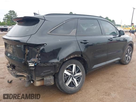 2023 Kia Sorento EX with VIN 5XYRH4LF8PG201804, listed as a IAAI auction lot 42096682 with 50,934 mi miles and . Bid and sale history available at DreamBid. Image 4.