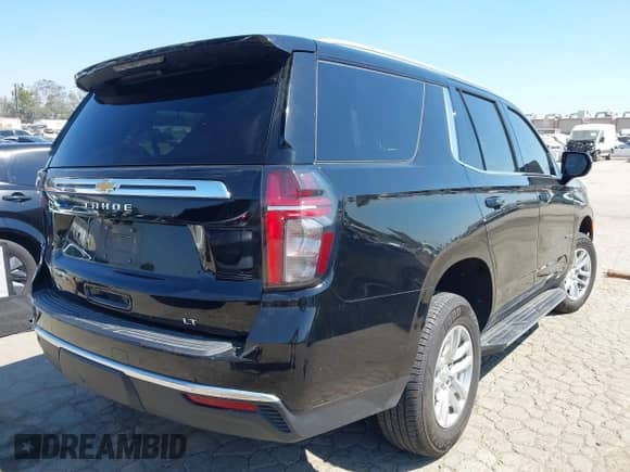 2021 Chevrolet Tahoe LT with VIN 1GNSCNKD3MR372714, listed as a IAAI auction lot 42918171 with 75,124 mi miles and . Bid and sale history available at DreamBid. Image 4.