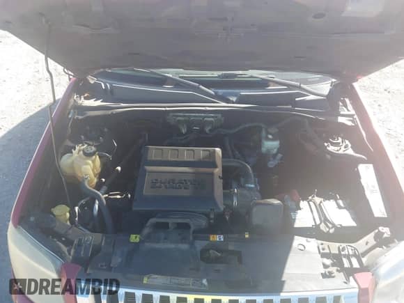 2009 Mercury Mariner with VIN 4M2CU81G79KJ00684, listed as a IAAI auction lot 43475086 with 241,545 mi miles and . Bid and sale history available at DreamBid. Image 10.