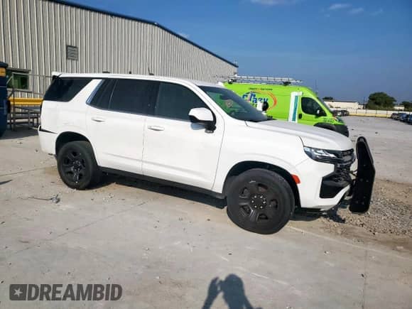2023 Chevrolet Tahoe Commercial with VIN 1GNSCLED2PR475904, listed as a Copart auction lot 66024635 with 16,970 mi miles and Salvage title. Bid and sale history available at DreamBid. Image 4.