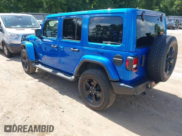 2022 Jeep Wrangler Unlimited Sahara with VIN 1C4HJXEN0NW207960, listed as a IAAI auction lot 42746690 with 79,779 mi miles and . Bid and sale history available at DreamBid. Image 3.