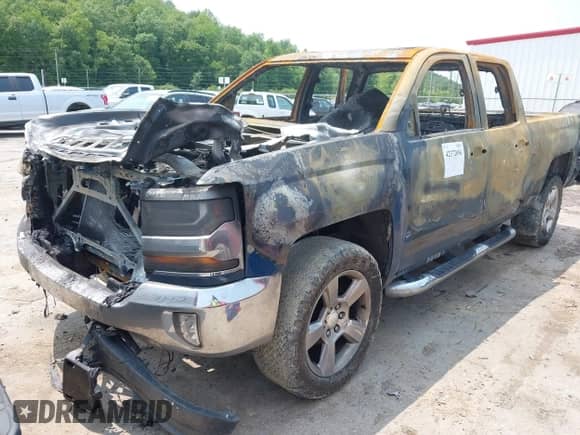2017 Chevrolet Silverado 1500 LT with VIN 1GCVKREH0HZ274535, listed as a IAAI auction lot 42372096 with 100,000 mi miles and . Bid and sale history available at DreamBid. Image 2.