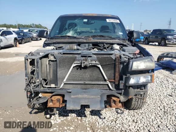 2004 Chevrolet Silverado 1500 Work Truck z VIN 1GCEC14X54Z131159, wystawiony jako Copart lot #50174095 z przebiegiem 61 774 mil mil oraz Szkoda całkowita • Salvage title. Historia ofert i sprzedaży dostępna na DreamBid. Obrazek 5.