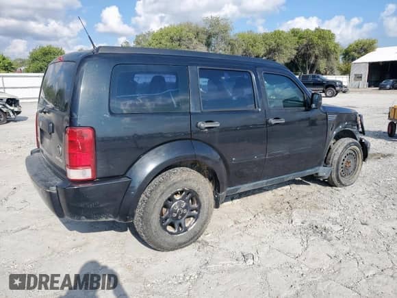 2011 Dodge Nitro SE with VIN 1D4PT2GK9BW509984, listed as a Copart auction lot 81227595 with 94,262 mi miles and Salvage title. Bid and sale history available at DreamBid. Image 3.