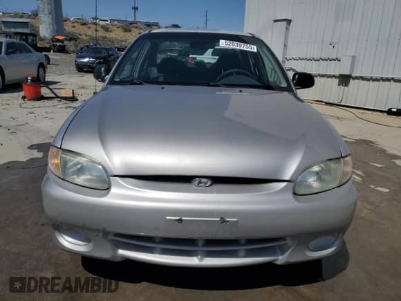 1998 Hyundai Accent GL z VIN KMHVF24N8WU500040, wystawiony jako Copart lot #52039755 z przebiegiem 103 631 mil mil oraz Szkoda całkowita • Salvage title. Historia ofert i sprzedaży dostępna na DreamBid. Obrazek 5.