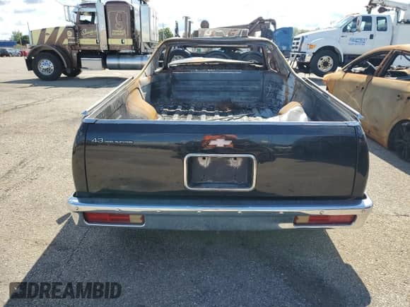 1987 Chevrolet El Camino with VIN 3GCCW80Z4HS908318, listed as a Copart auction lot 69823295 with Not provided miles and Salvage title. Bid and sale history available at DreamBid. Image 6.