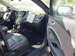 2015 Hyundai Santa Fe z VIN 5XYZU3LB2FG291551, wystawiony jako IAAI lot #43149569 z przebiegiem 137 312 mil mil oraz . Historia ofert i sprzedaży dostępna na DreamBid. Obrazek 5.