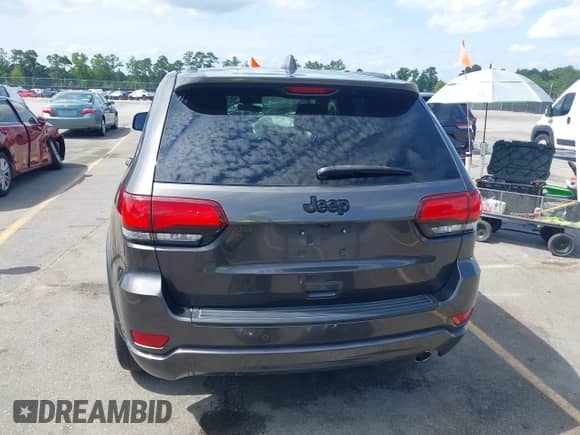 2021 Jeep Grand Cherokee Laredo E with VIN 1C4RJEAG1MC712308, listed as a IAAI auction lot 42480793 with 66,125 mi miles and . Bid and sale history available at DreamBid. Image 17.