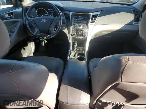 2013 Hyundai Sonata с VIN KMHEC4A41DA099803, выставлен на аукционе Copart как лот 82477085 с пробегом 188 610 миль миль и Списание • Salvage title. История ставок и продаж доступна на DreamBid. Изображение 8.