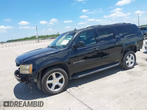 2013 Chevrolet Suburban LT with VIN 1GNSKJE71DR168382, listed as a IAAI auction lot 42821206 with 209,210 mi miles and . Bid and sale history available at DreamBid. Image 2.