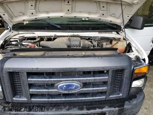 2013 Ford Econoline Cargo Commercial with VIN 1FTNE1EWXDDA97815, listed as a Copart auction lot 57268985 with 120,609 mi miles and Non repairable. Bid and sale history available at DreamBid. Image 12.