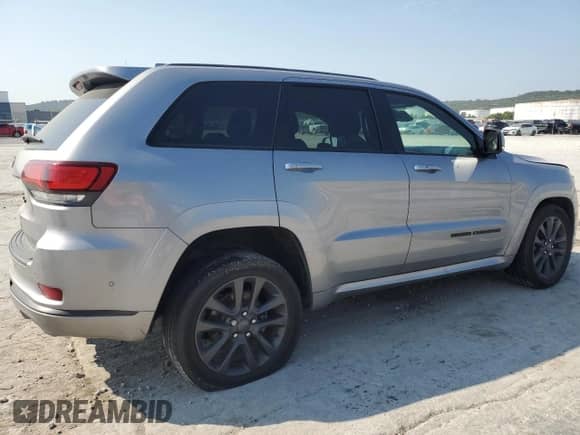 2018 Jeep Grand Cherokee High Altitude с VIN 1C4RJECG4JC512676, выставлен на аукционе Copart как лот 71816195 с пробегом 84 664 миль миль и Списание • Salvage title. История ставок и продаж доступна на DreamBid. Изображение 3.