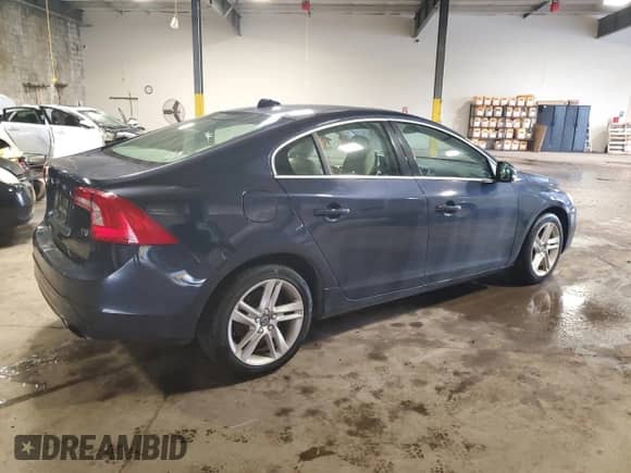 2015 Volvo S60 T5 Drive-E Premier with VIN YV126MFK9F1354636, listed as a Copart auction lot 61228855 with 143,125 mi miles and Salvage title. Bid and sale history available at DreamBid. Image 3.
