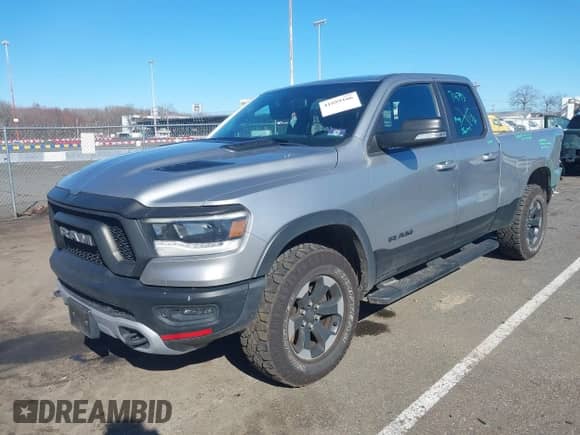 2019 Ram 1500 Rebel with VIN 1C6SRFET2KN671753, listed as a IAAI auction lot 41889166 with 72,883 mi miles and . Bid and sale history available at DreamBid. Image 2.