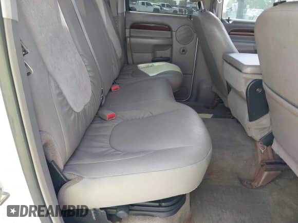 2003 Dodge 2500 ST z VIN 1D7KU28D43J537703, wystawiony jako IAAI lot #42150162 z przebiegiem 224 783 mil mil oraz . Historia ofert i sprzedaży dostępna na DreamBid. Obrazek 8.