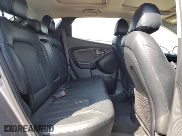 2015 Hyundai Tucson SE z VIN KM8JUCAG5FU026922, wystawiony jako Copart lot #80523575 z przebiegiem 96 176 mil mil oraz Szkoda całkowita • Salvage title. Historia ofert i sprzedaży dostępna na DreamBid. Obrazek 11.