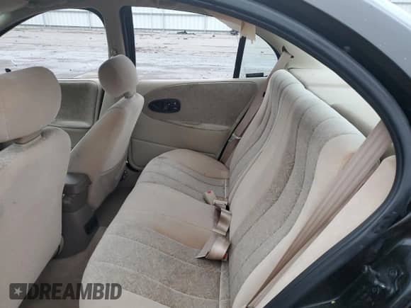 1996 Saturn SL with VIN 1G8ZK5276TZ240883, listed as a Copart auction lot 84172554 with 69,820 mi miles and Salvage title. Bid and sale history available at DreamBid. Image 10.