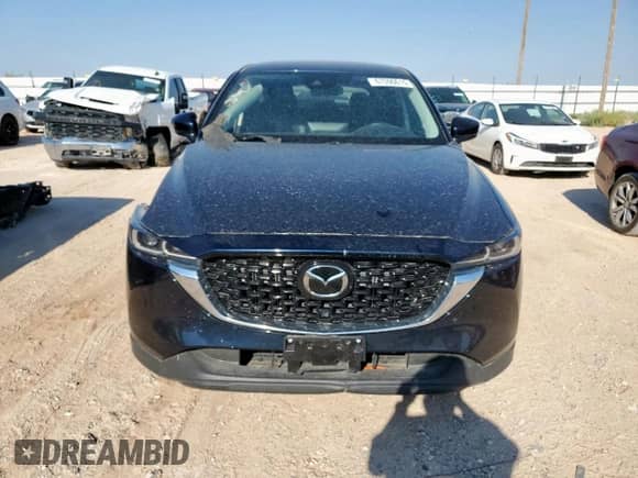 2023 Mazda CX-5 S Select with VIN JM3KFBBM0P0285688, listed as a Copart auction lot 67590615 with 28,029 mi miles and Salvage title. Bid and sale history available at DreamBid. Image 5.