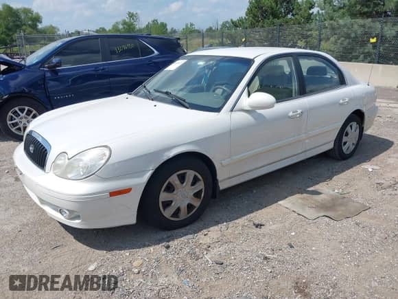 2002 Hyundai Sonata z VIN KMHWF25S22A588426, wystawiony jako IAAI lot #42965475 z przebiegiem 58 214 mil mil oraz . Historia ofert i sprzedaży dostępna na DreamBid. Obrazek 2.