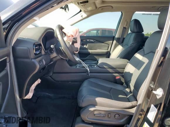 2025 Honda Pilot Touring с VIN 5FNYG2H70SB016778, выставлен на аукционе Copart как лот 80070135 с пробегом Не указан миль и Списание • Salvage title. История ставок и продаж доступна на DreamBid. Изображение 7.