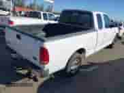 1998 Ford F-150 z VIN 2FTZX1764WCA42109, wystawiony jako IAAI lot #43409593 z przebiegiem 249 476 mil mil oraz . Historia ofert i sprzedaży dostępna na DreamBid. Obrazek 4.