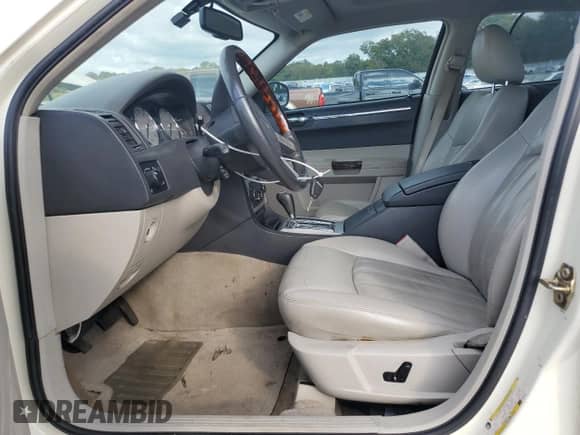 2006 Chrysler 300 C with VIN 2C3KK63H96H328243, listed as a Copart auction lot 81788035 with 155,001 mi miles and Salvage title. Bid and sale history available at DreamBid. Image 7.