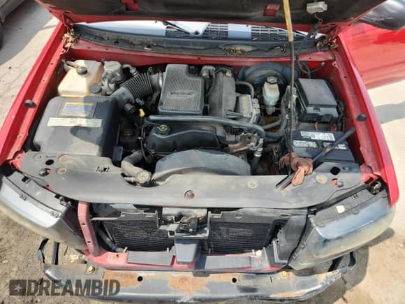 2002 Chevrolet TrailBlazer LS with VIN 1GNDT13S222187218, listed as a Copart auction lot 60282145 with 173,423 mi miles and Salvage title. Bid and sale history available at DreamBid. Image 12.