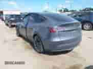 2023 Tesla Model Y Long Range with VIN 7SAYGDEE8PA163534, listed as a IAAI auction lot 42795393 with 45,172 mi miles and . Bid and sale history available at DreamBid. Image 3.