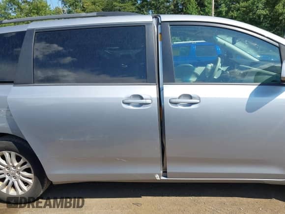 2013 Toyota Sienna XLE AAS with VIN 5TDYK3DC2DS343012, listed as a IAAI auction lot 43014501 with 130,513 mi miles and . Bid and sale history available at DreamBid. Image 14.
