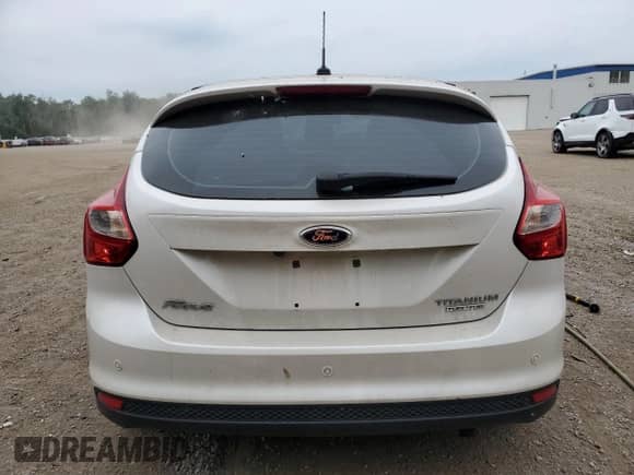 2012 Ford Focus Titanium с VIN 1FAHP3N21CL438996, выставлен на аукционе Copart как лот 65748925 с пробегом 96 113 миль миль и Списание • Salvage title. История ставок и продаж доступна на DreamBid. Изображение 6.